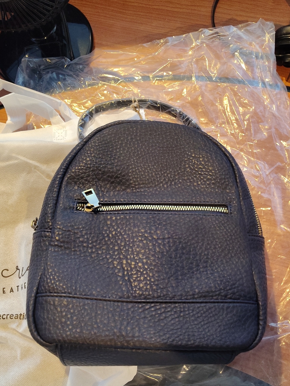 Pebbled Mini Backpack in Navy Blue with Front Zip Pocket